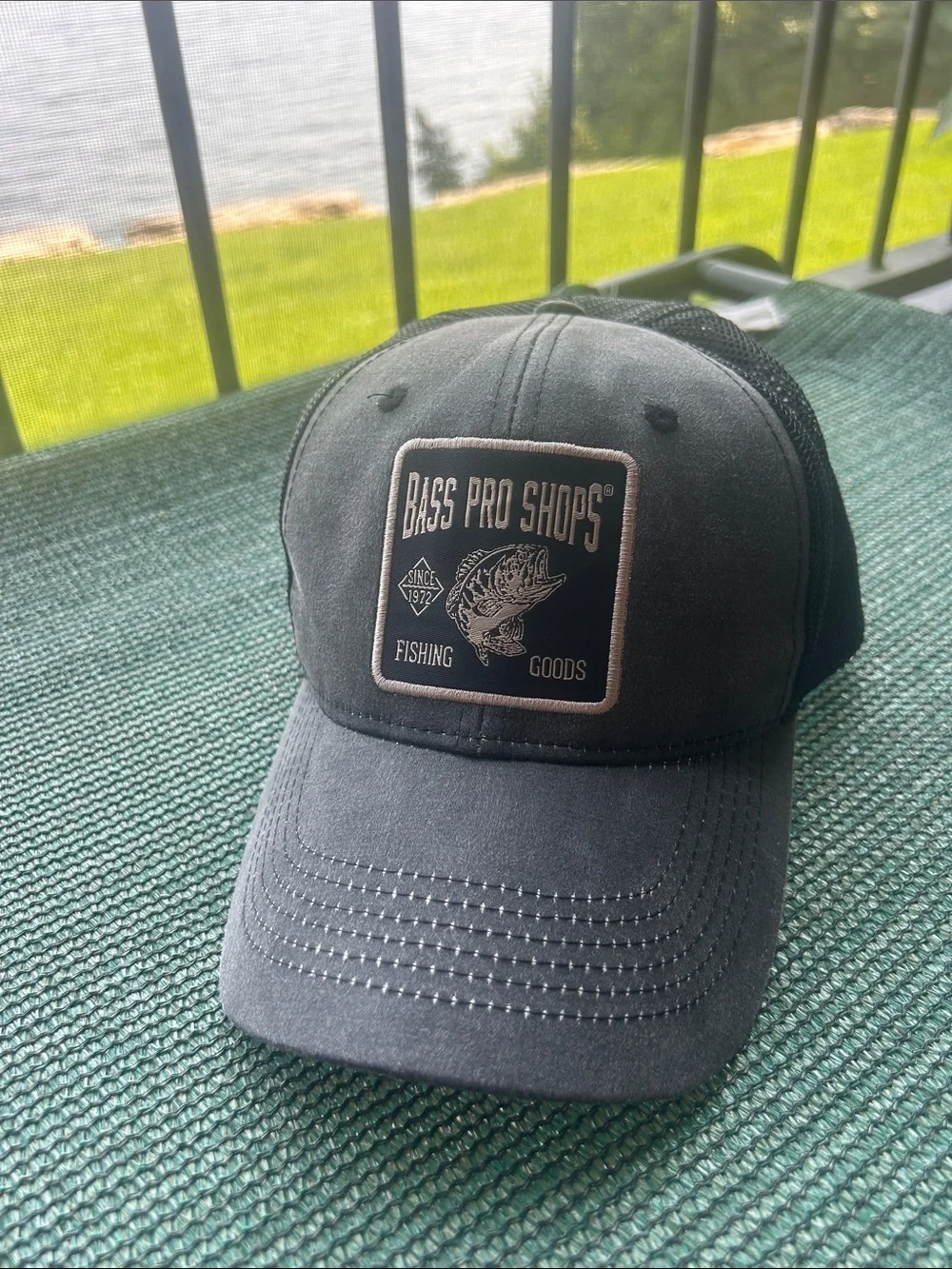 Bass Pro Shops Black and Cream Embroidered Fishing Patch Trucker Hat